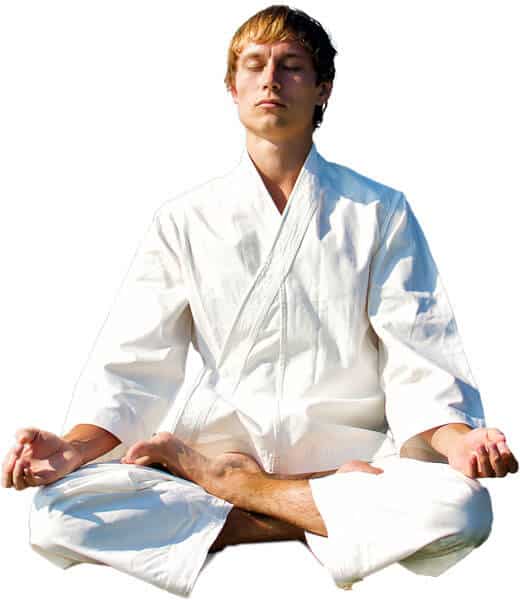 Martial Arts Lessons for Adults in Rockwall TX - Young Man Thinking and Meditating in White